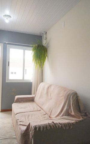 Casa de condomínio à venda com 48m², 2 quartos e 2 vagasSala