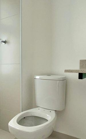 Apartamento à venda com 56m², 2 quartos e 1 vaga Apartamento à venda com 56m², 2 quartos e 1 vagaBanheiro da Suíte