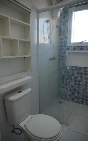 Casa de condomínio à venda com 124m², 3 quartos e 2 vagasBanheiro da Suíte