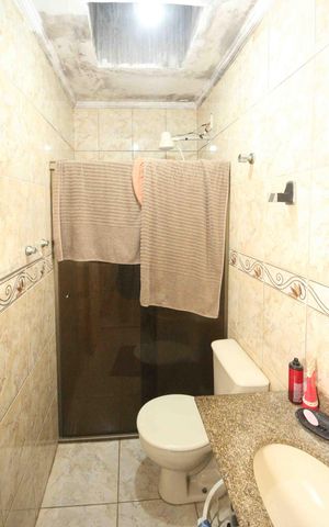 Casa de condomínio à venda com 110m², 2 quartos e 2 vagasBanheiro da Suite