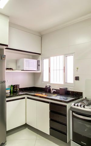 Casa à venda com 198m², 5 quartos e 3 vagas Casa à venda com 198m², 5 quartos e 3 vagasCozinha da casa 4