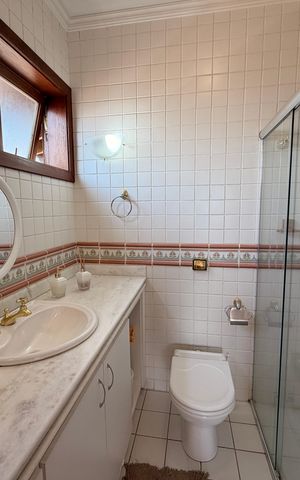 Casa de condomínio à venda com 360m², 3 quartos e 4 vagasBanheiro da Suíte 2