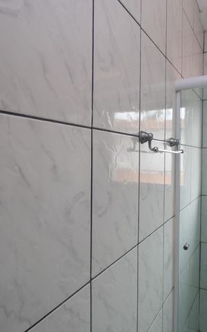 Casa à venda com 100m², 3 quartos e 2 vagas Casa à venda com 100m², 3 quartos e 2 vagasBanheiro 2
