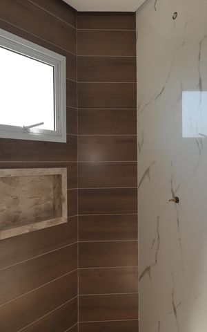 Casa à venda com 140m², 2 quartos e 3 vagasBanheiro da Suíte 1