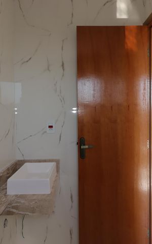 Casa à venda com 140m², 2 quartos e 3 vagasBanheiro da Suíte 1