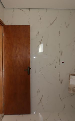 Casa à venda com 140m², 2 quartos e 3 vagasBanheiro da Suíte 2