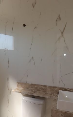 Casa à venda com 140m², 2 quartos e 3 vagasBanheiro da Suíte 1