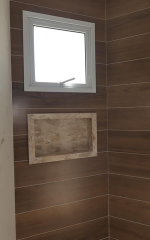 Casa à venda com 140m², 2 quartos e 3 vagasBanheiro da Suíte 1
