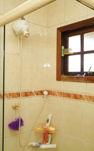 Casa à venda com 338m², 4 quartos e 4 vagasBanheiro 1 - Suíte - Quarto 3