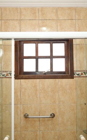 Casa à venda com 338m², 4 quartos e 4 vagasBanheiro 3