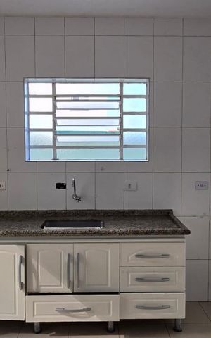 Casa à venda com 141m², 3 quartos e 2 vagas Casa à venda com 141m², 3 quartos e 2 vagasCozinha