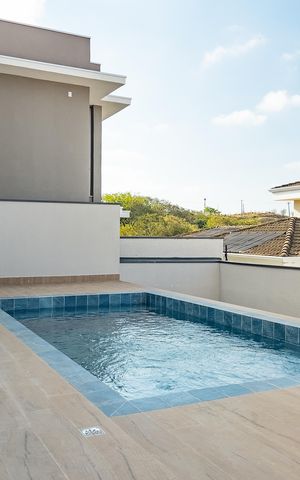 Casa de condomínio à venda com 319m², 4 quartos e 4 vagas Casa de condomínio à venda com 319m², 4 quartos e 4 vagasÁrea externa