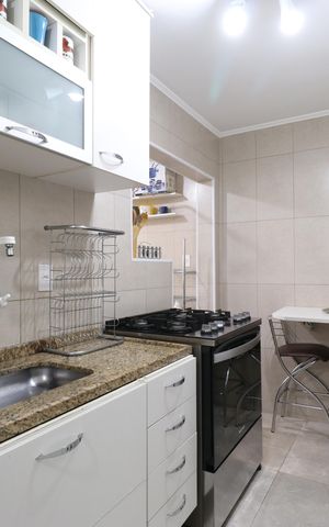 Apartamento à venda com 74m², 2 quartos e sem vagaCozinha e Área de serviço 