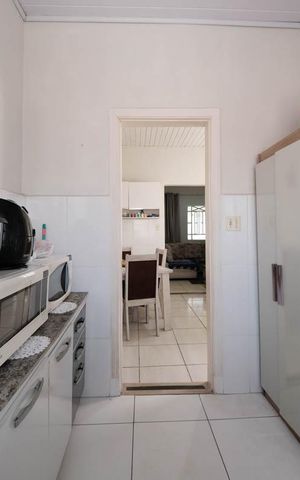 Casa à venda com 248m², 4 quartos e 2 vagasCozinha e Área de Serviço