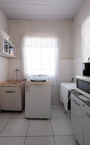 Casa à venda com 248m², 4 quartos e 2 vagasCozinha e Área de Serviço
