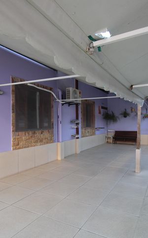 Casa de condomínio à venda com 274m², 4 quartos e 1 vagaQuintal