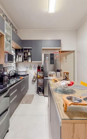 Casa à venda com 160m², 3 quartos e 2 vagas Casa à venda com 160m², 3 quartos e 2 vagasCozinha
