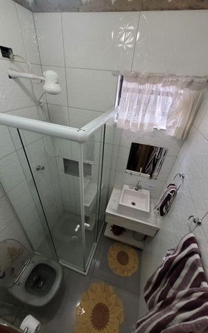 Casa à venda com 200m², 4 quartos e 2 vagasBanheiro
