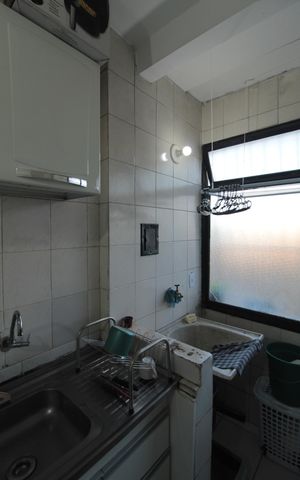 Apartamento à venda com 77m², 2 quartos e 1 vagaCozinha e Área de Serviço