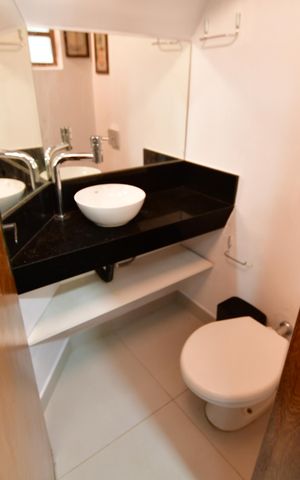 Casa de condomínio à venda com 70m², 2 quartos e 1 vagaBanheiro de serviço