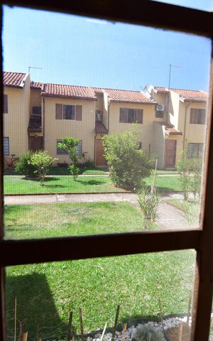Casa de condomínio à venda com 70m², 2 quartos e 1 vagaSala - Vista
