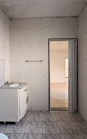 Casa para alugar com 60m², 2 quartos e 1 vagaBanheiro da suíte 