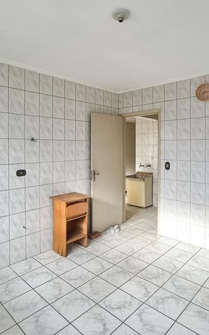 Casa à venda com 130m², 2 quartos e 2 vagas Casa à venda com 130m², 2 quartos e 2 vagasCozinha