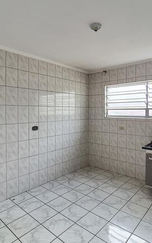Casa à venda com 130m², 2 quartos e 2 vagas Casa à venda com 130m², 2 quartos e 2 vagasCozinha