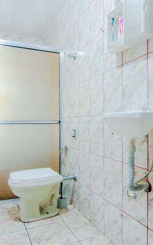Casa à venda com 250m², 5 quartos e 3 vagasBanheiro