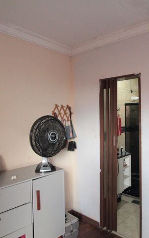 Casa à venda com 235m², 4 quartos e 1 vagaCasa 1 | Suite