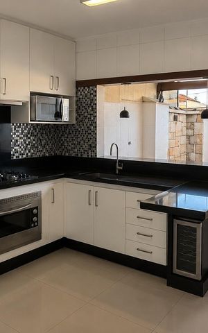 Casa de condomínio à venda com 70m², 2 quartos e 1 vagaCozinha