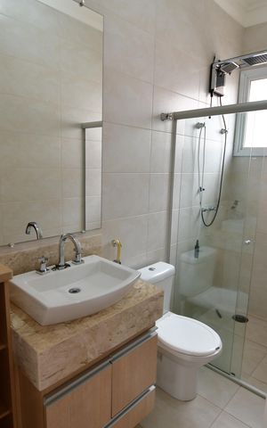 Casa de condomínio à venda com 900m², 5 quartos e 6 vagasBanheiro Suíte