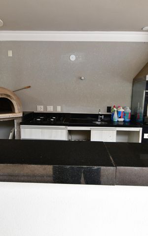 Casa de condomínio à venda com 900m², 5 quartos e 6 vagasVaranda gourmet