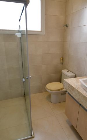 Casa de condomínio à venda com 900m², 5 quartos e 6 vagasBanheiro Suíte 2