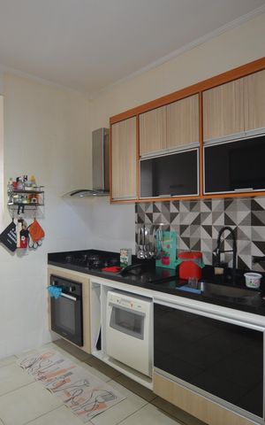 Apartamento à venda com 112m², 2 quartos e 2 vagasCozinha e Área de Serviço