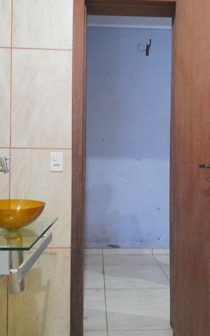 Casa à venda com 50m², 2 quartos e 2 vagasBanheiro (Sala 2)