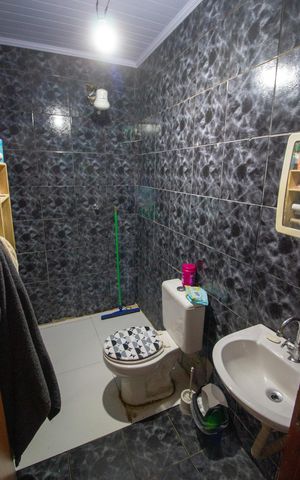 Casa à venda com 82m², 2 quartos e 3 vagasBanheiro 2