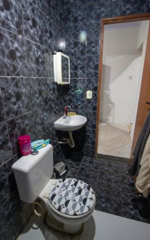 Casa à venda com 82m², 2 quartos e 3 vagasBanheiro 2