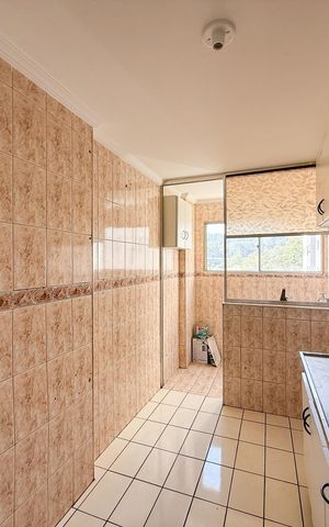 Apartamento à venda com 55m², 2 quartos e 1 vaga Apartamento à venda com 55m², 2 quartos e 1 vagaCozinha e Área de Serviço