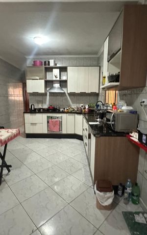 Casa à venda com 150m², 3 quartos e 3 vagas Casa à venda com 150m², 3 quartos e 3 vagasCozinha
