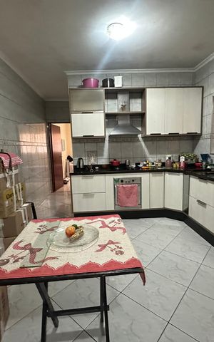 Casa à venda com 150m², 3 quartos e 3 vagas Casa à venda com 150m², 3 quartos e 3 vagasCozinha