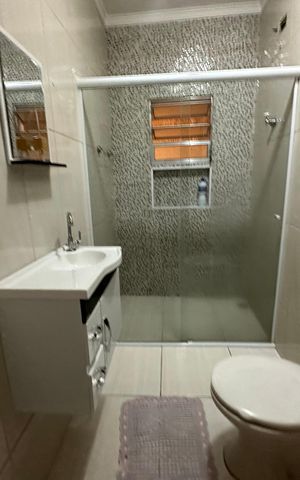 Casa à venda com 150m², 3 quartos e 3 vagas Casa à venda com 150m², 3 quartos e 3 vagasBanheiro 2