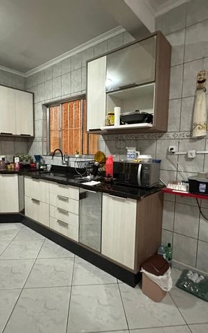 Casa à venda com 150m², 3 quartos e 3 vagas Casa à venda com 150m², 3 quartos e 3 vagasCozinha