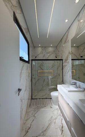 Casa de condomínio à venda com 199m², 3 quartos e 4 vagasBanheiro