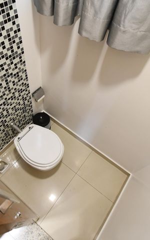 Casa de condomínio para alugar com 180m², 3 quartos e 4 vagasLavabo da sala