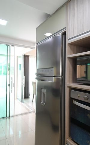 Casa de condomínio para alugar com 180m², 3 quartos e 4 vagasCozinha