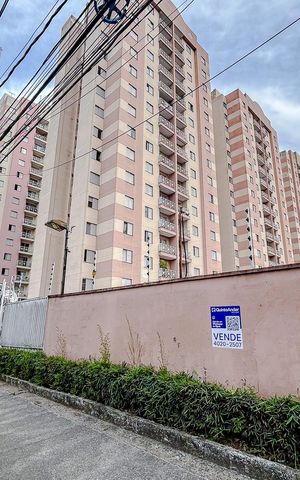 Apartamento à venda com 54m², 2 quartos e 1 vagaFachada com Plaquinha