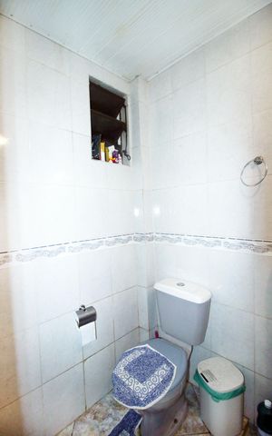 Casa à venda com 300m², 2 quartos e 1 vagaBanheiro social