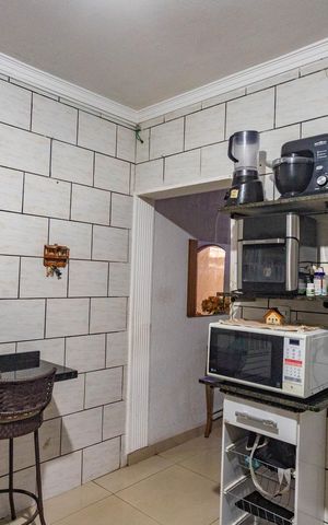 Casa à venda com 50m², 4 quartos e 1 vaga Casa à venda com 50m², 4 quartos e 1 vagaCozinha