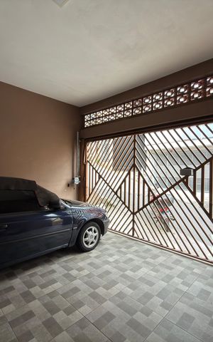 Casa à venda com 96m², 4 quartos e 2 vagas Casa à venda com 96m², 4 quartos e 2 vagasGaragem